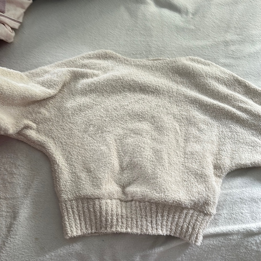 cream sweater